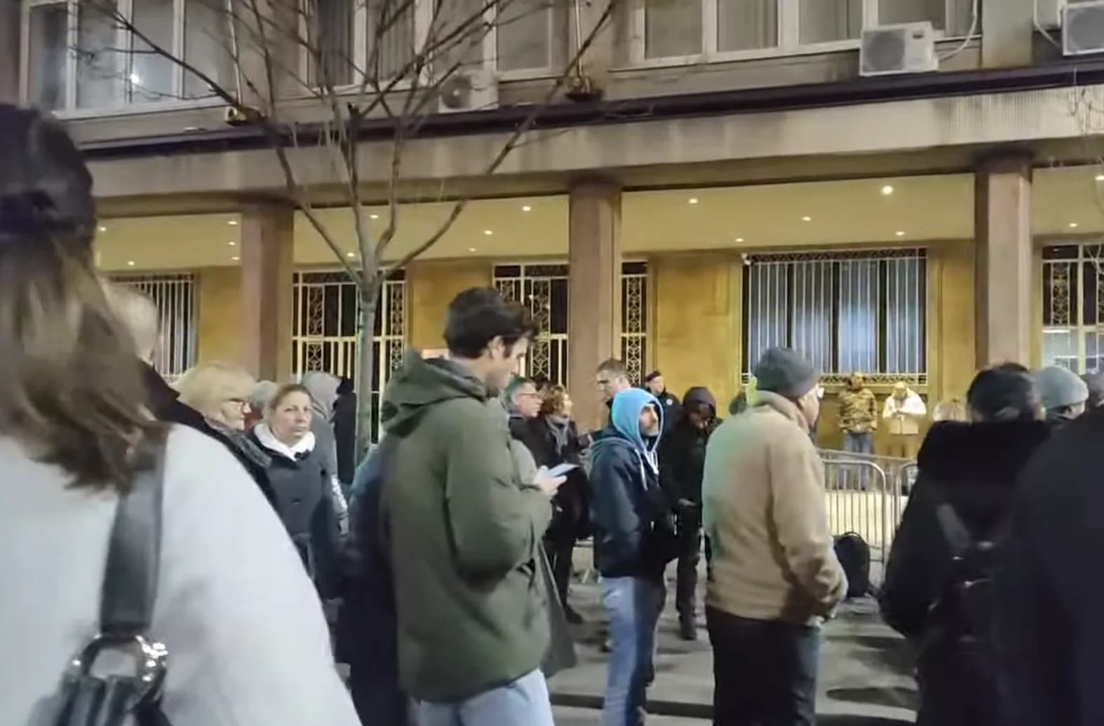 People demonstrate outside Serbia’s Republic Electoral Commission building.