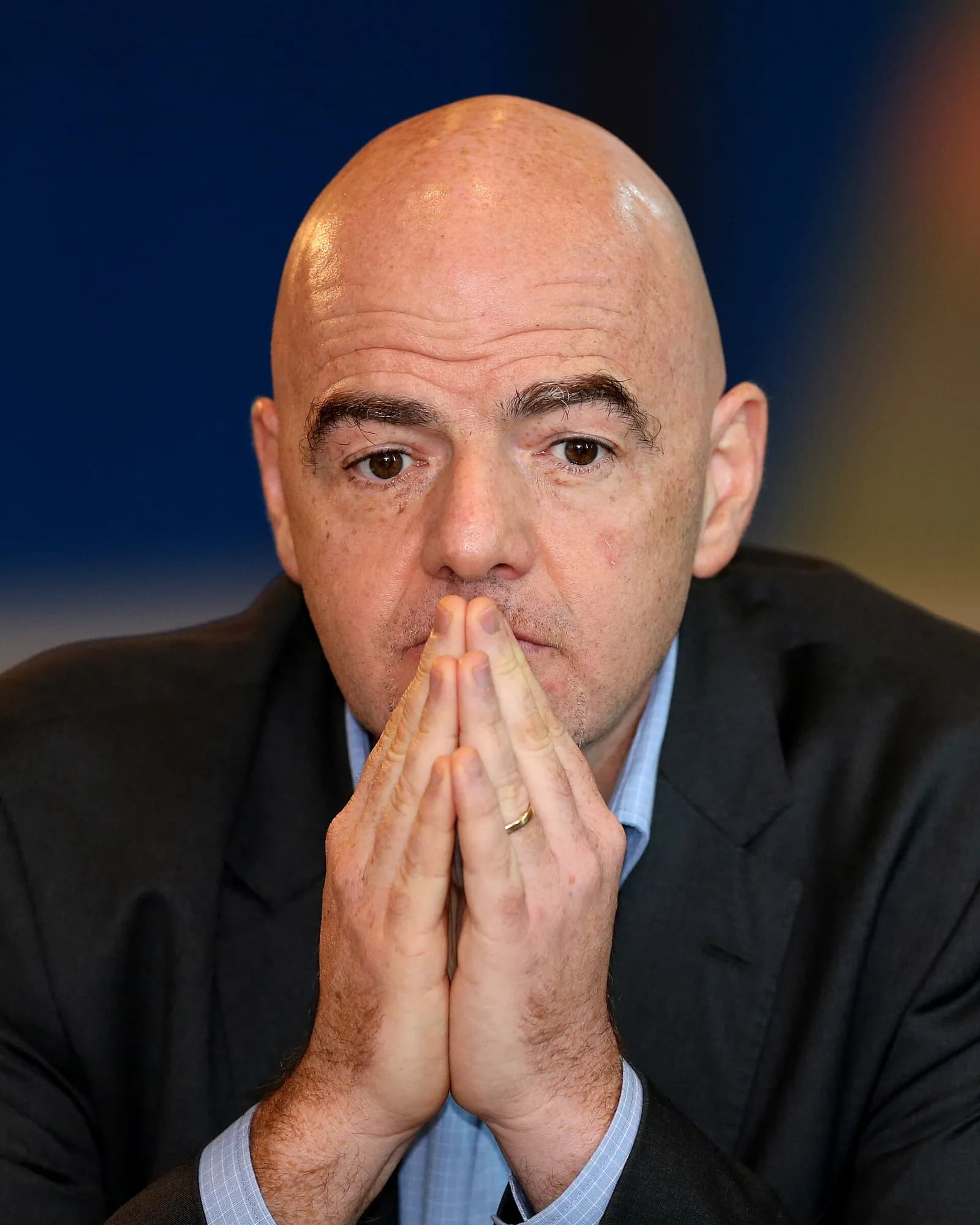 Gianni Infantino at a press conference in Doha.