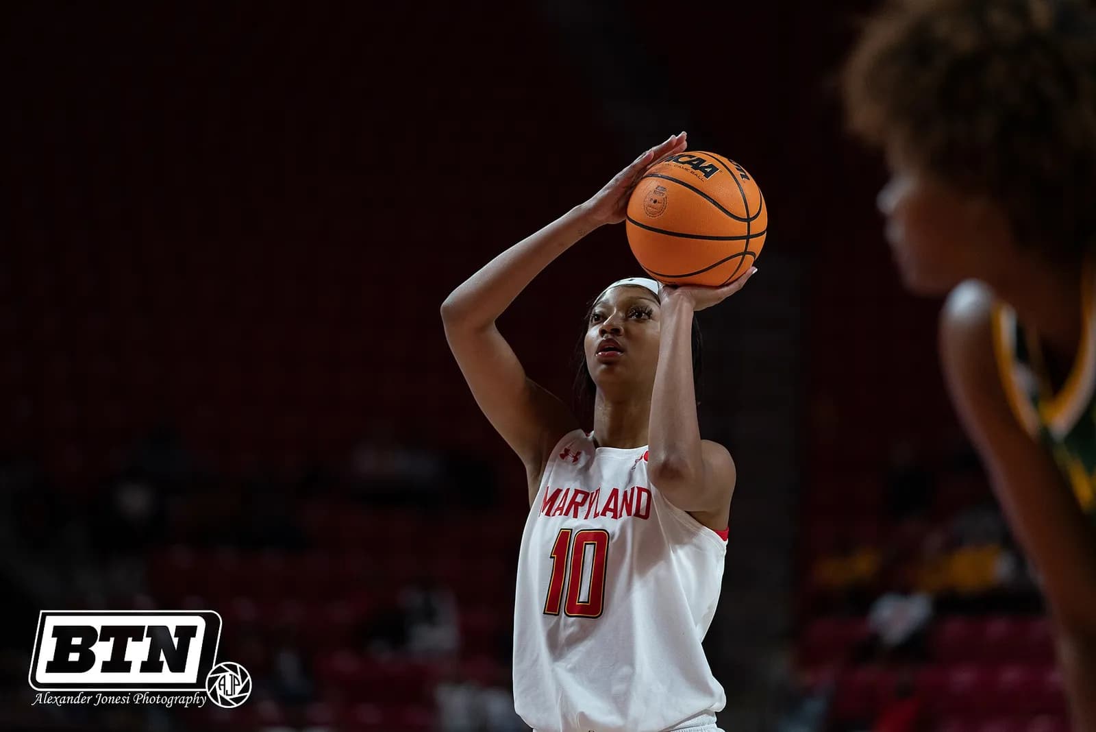 Angel Reese playing basketball in 2021.
