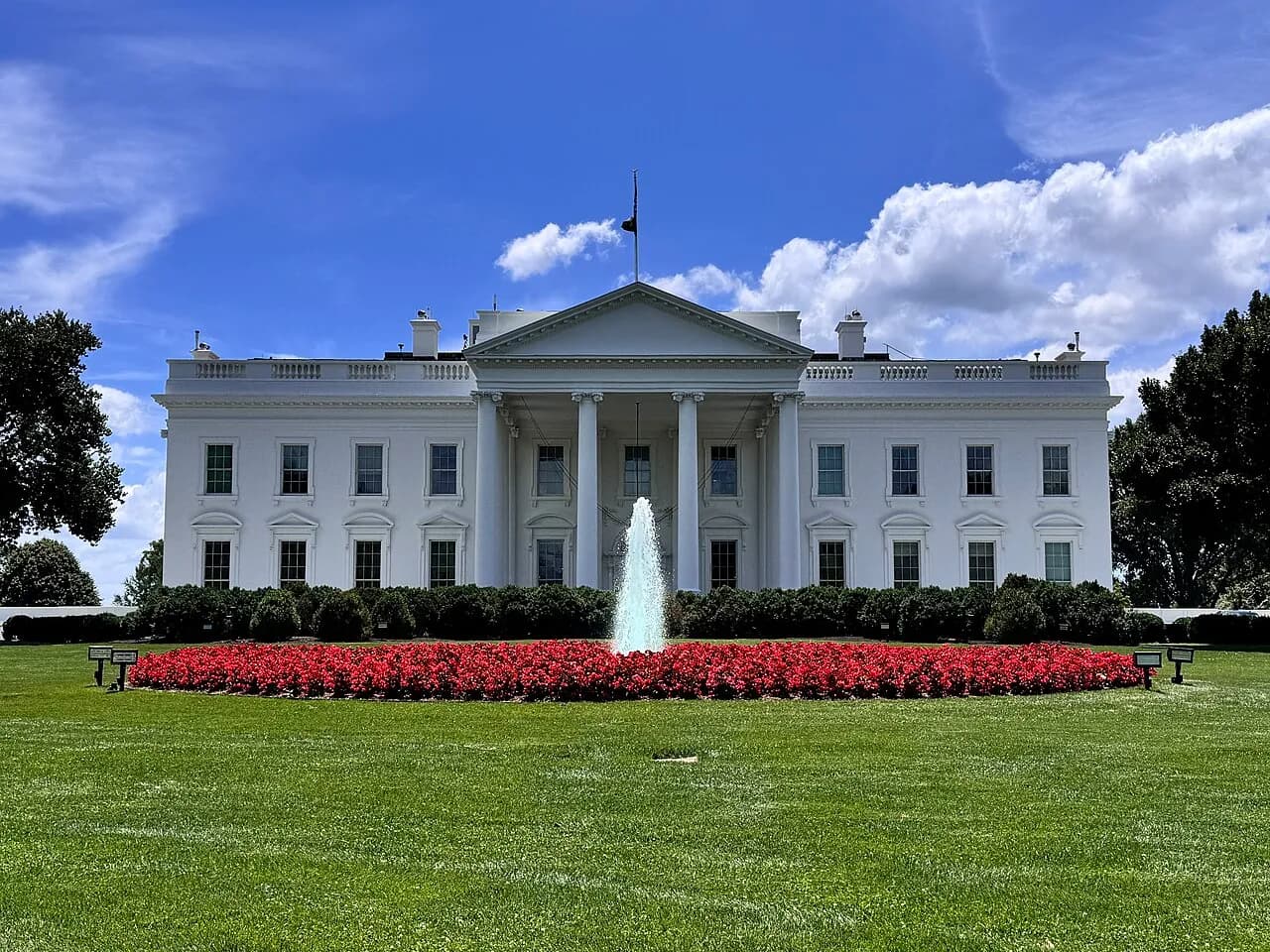 The White House north facade, lawn and fountain viewed from Lafayette Square in Washington, D.C.