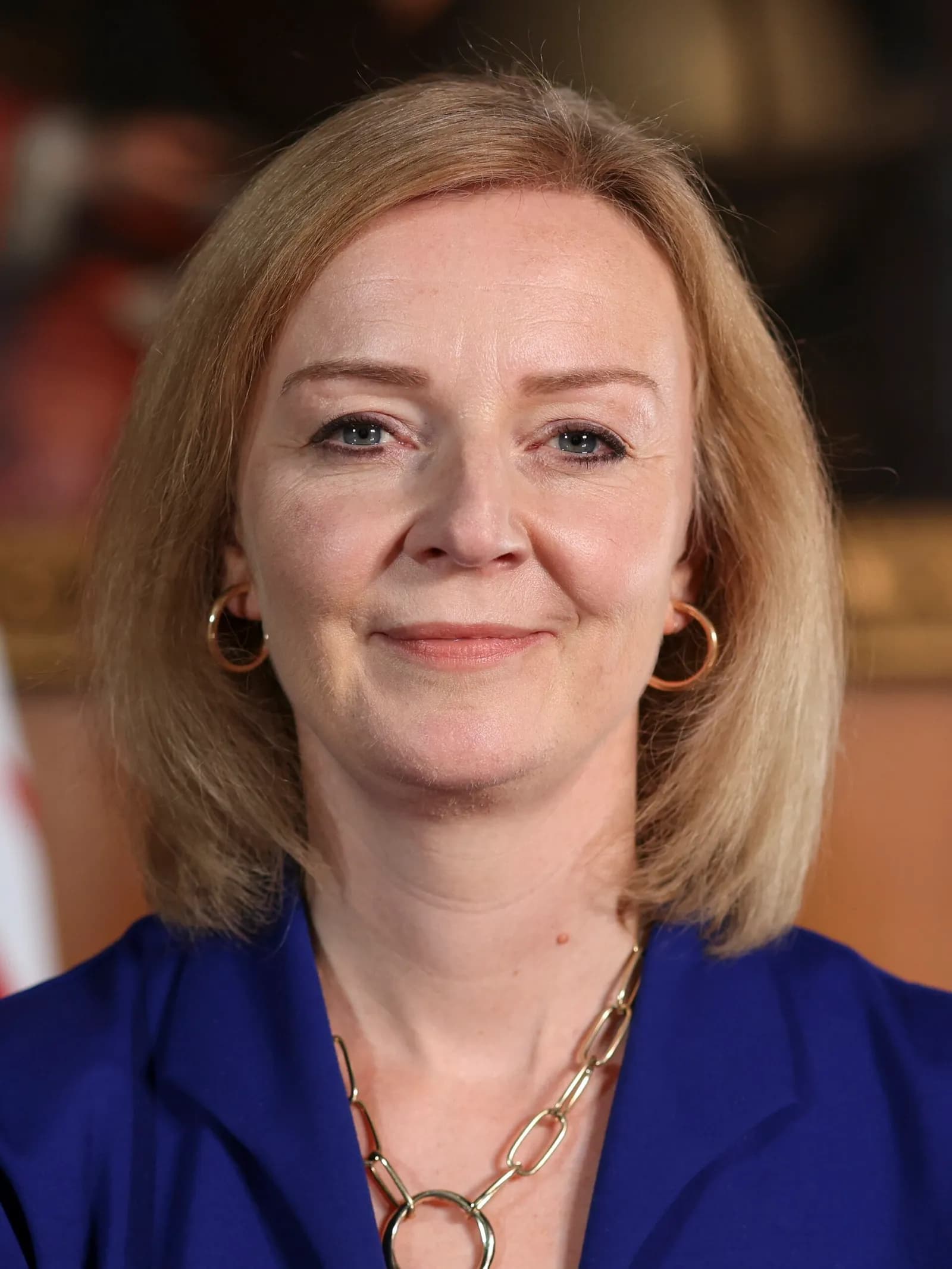 Liz Truss in an official cabinet portrait.