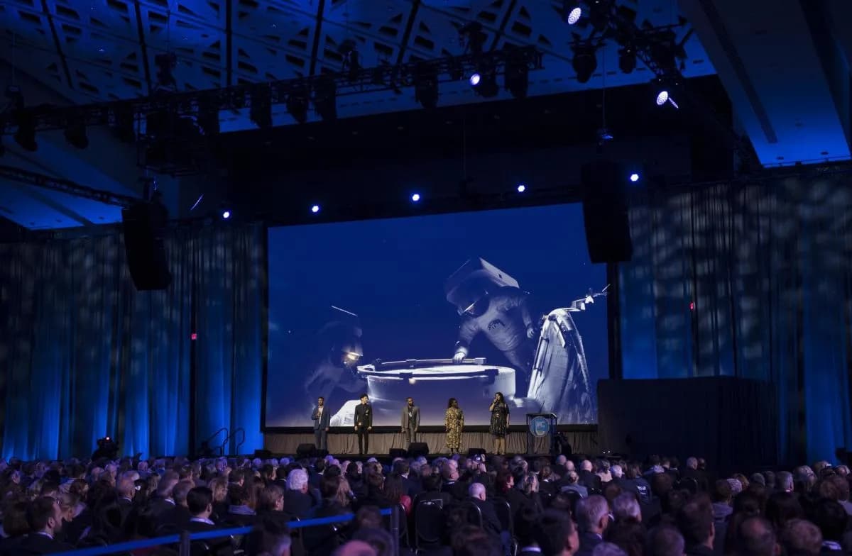 Performers sing at the opening ceremony of the 2019 International Astronautical Congress in Washington