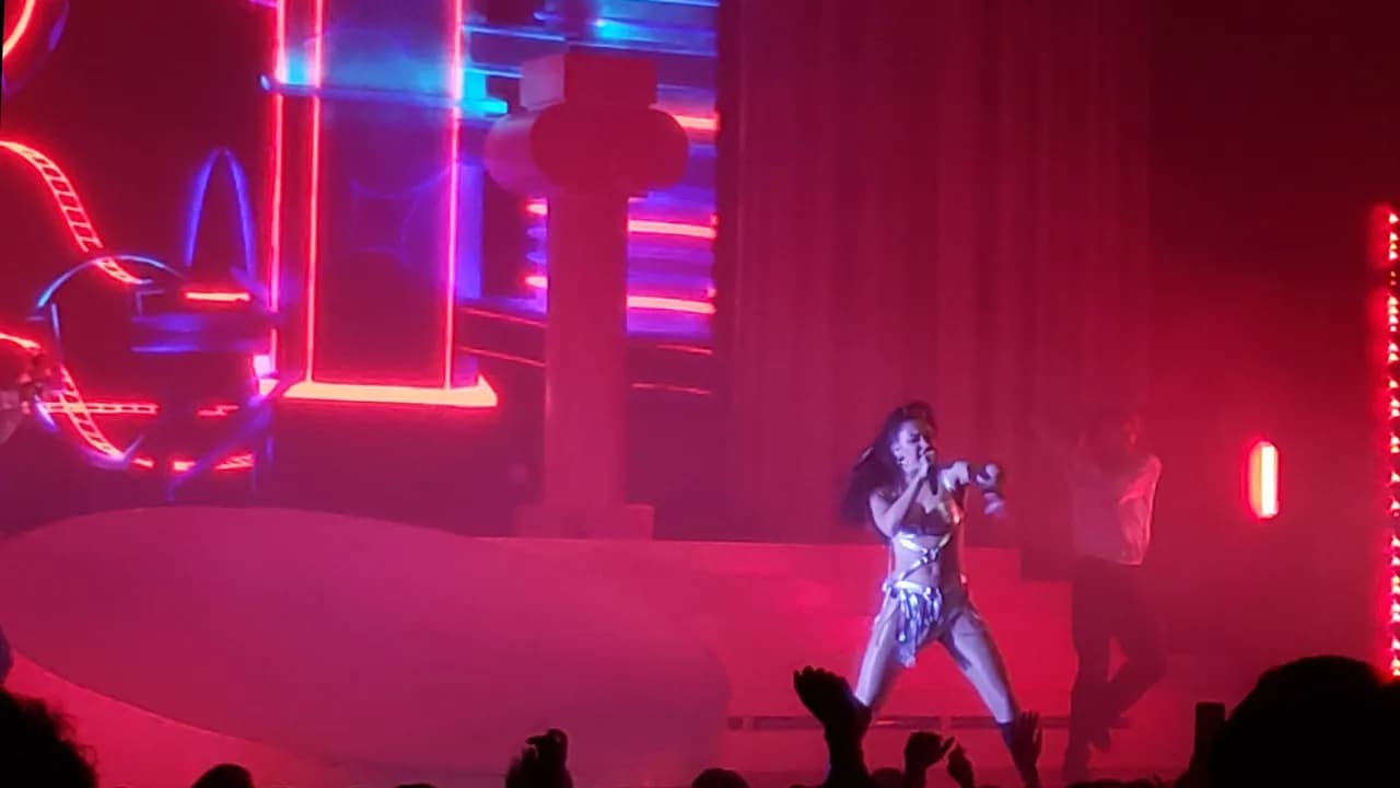 Charli XCX performing onstage at the Fox Theatre.