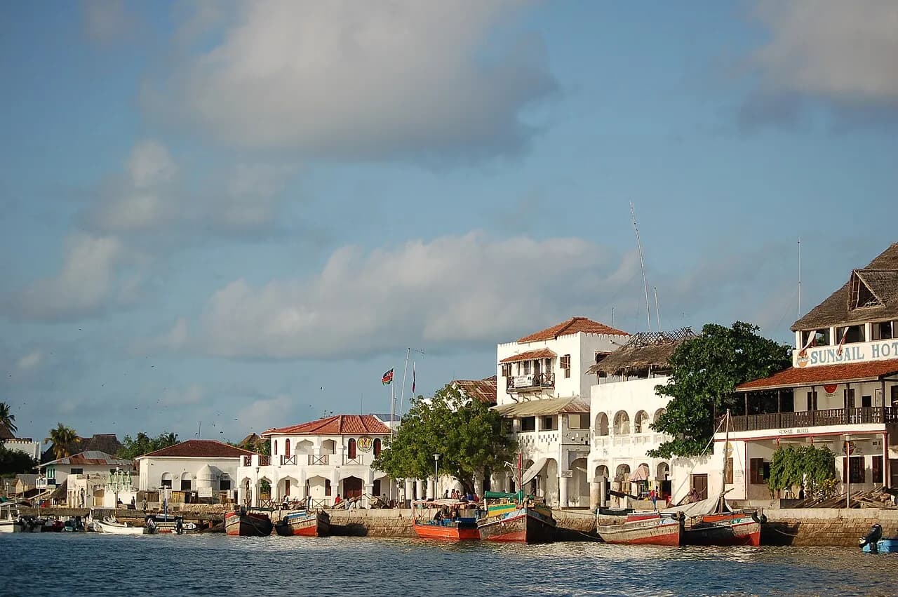 Boats beside buildings on the waterfront of Lamu Island, Kenya