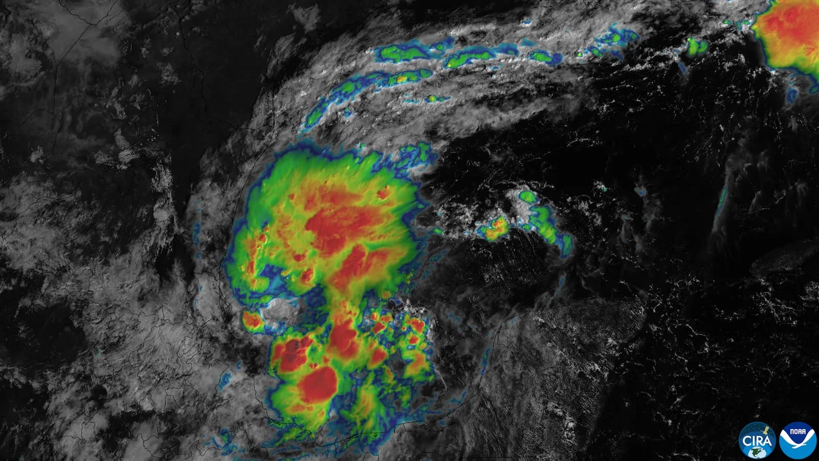 Satellite imagery shows Tropical Depression Nine forming in the southwestern Gulf of Mexico.