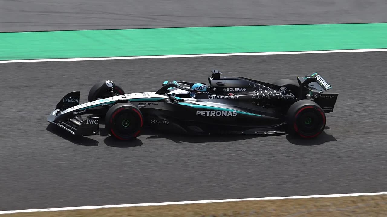George Russell driving a Mercedes Formula 1 car during practice at Suzuka in 2025