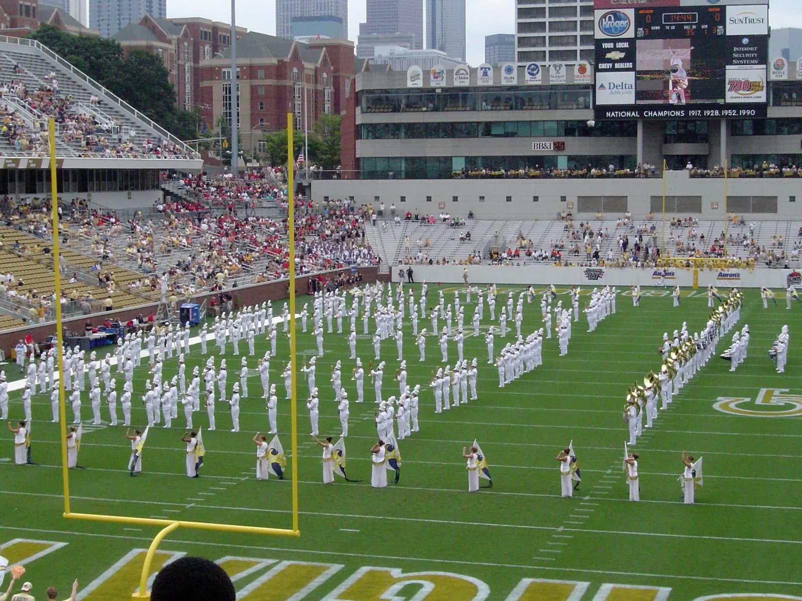 Georgia Tech Marching Band performs on the field inside Bobby Dodd Stadium.