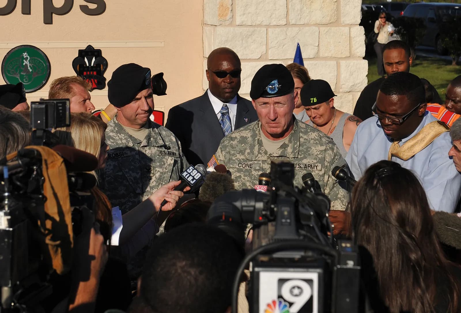 Lt. Gen. Robert Cone briefs media outside the main entrance of Fort Hood, Texas.