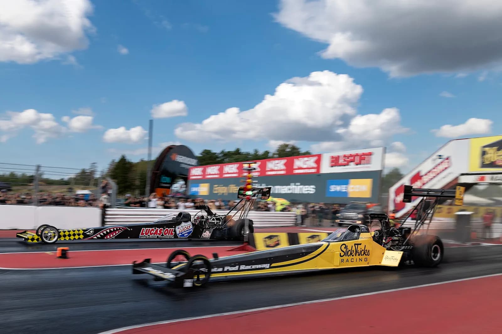 Susanne Callin with a Top Fuel dragster at Mantorp Park.
