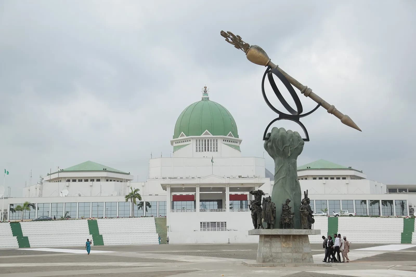 Nigeria’s National Assembly building in Abuja, with a large mace sculpture in the foreground.