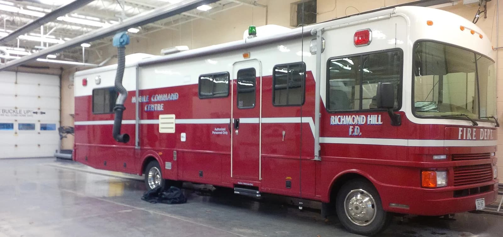 A Richmond Hill Fire Command vehicle inside a garage.