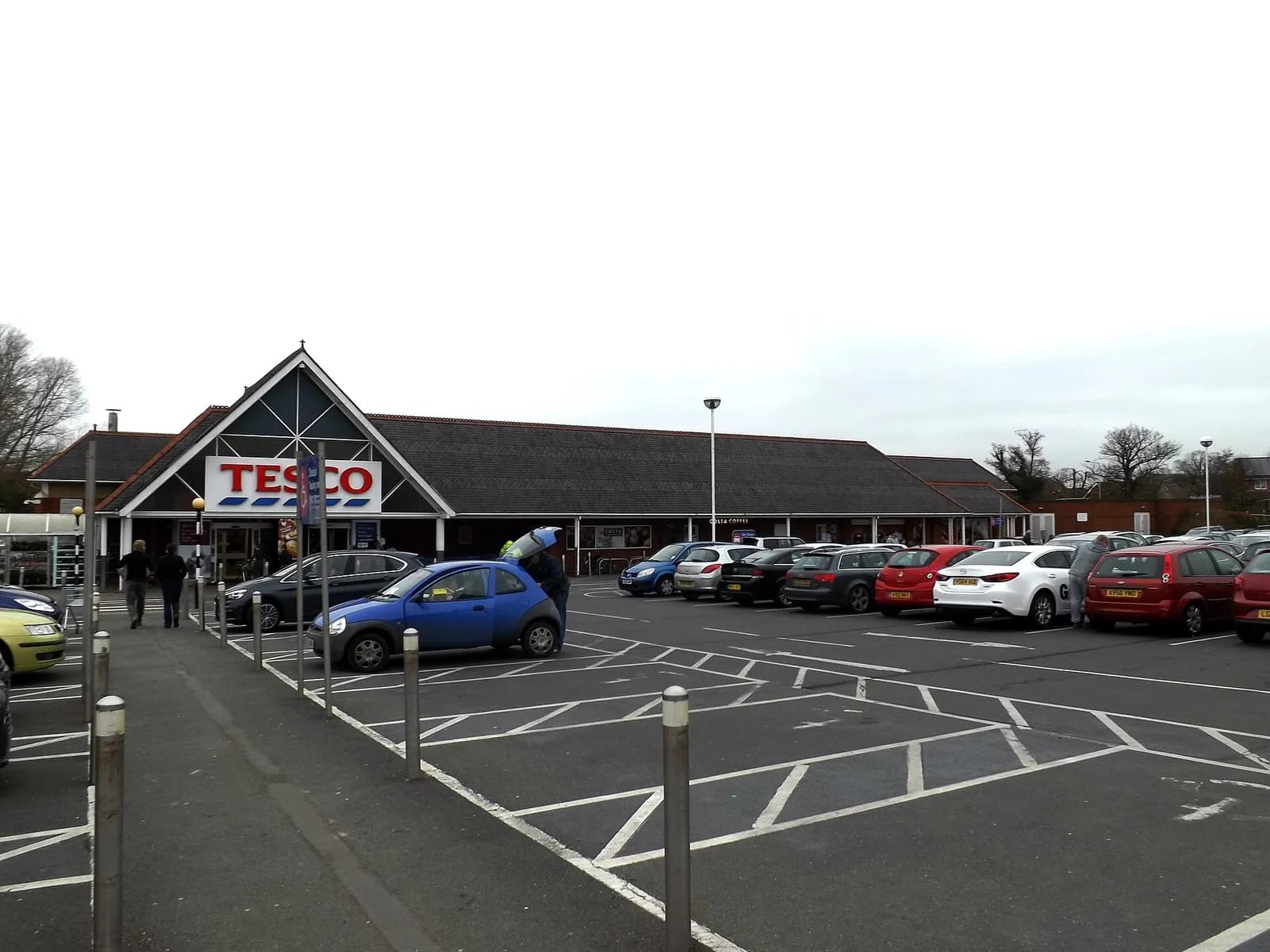 Tesco supermarket building and parking area in Stowmarket, England.