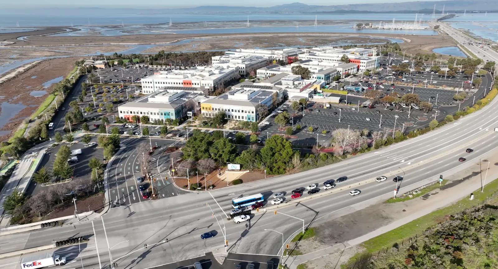 Aerial view of Meta’s headquarters and sign.