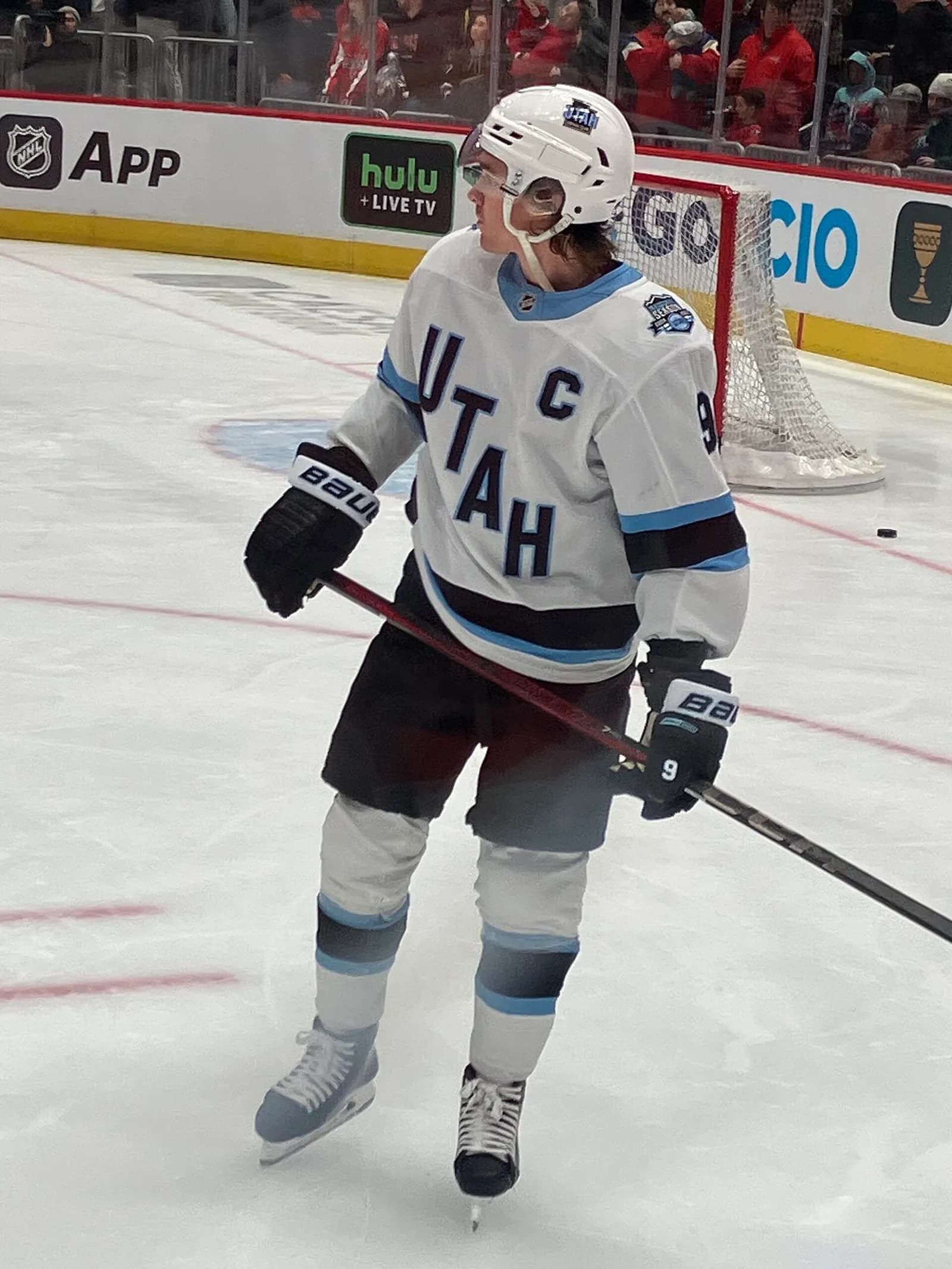 Utah Hockey Club captain Clayton Keller stands on the ice during pregame warmups.