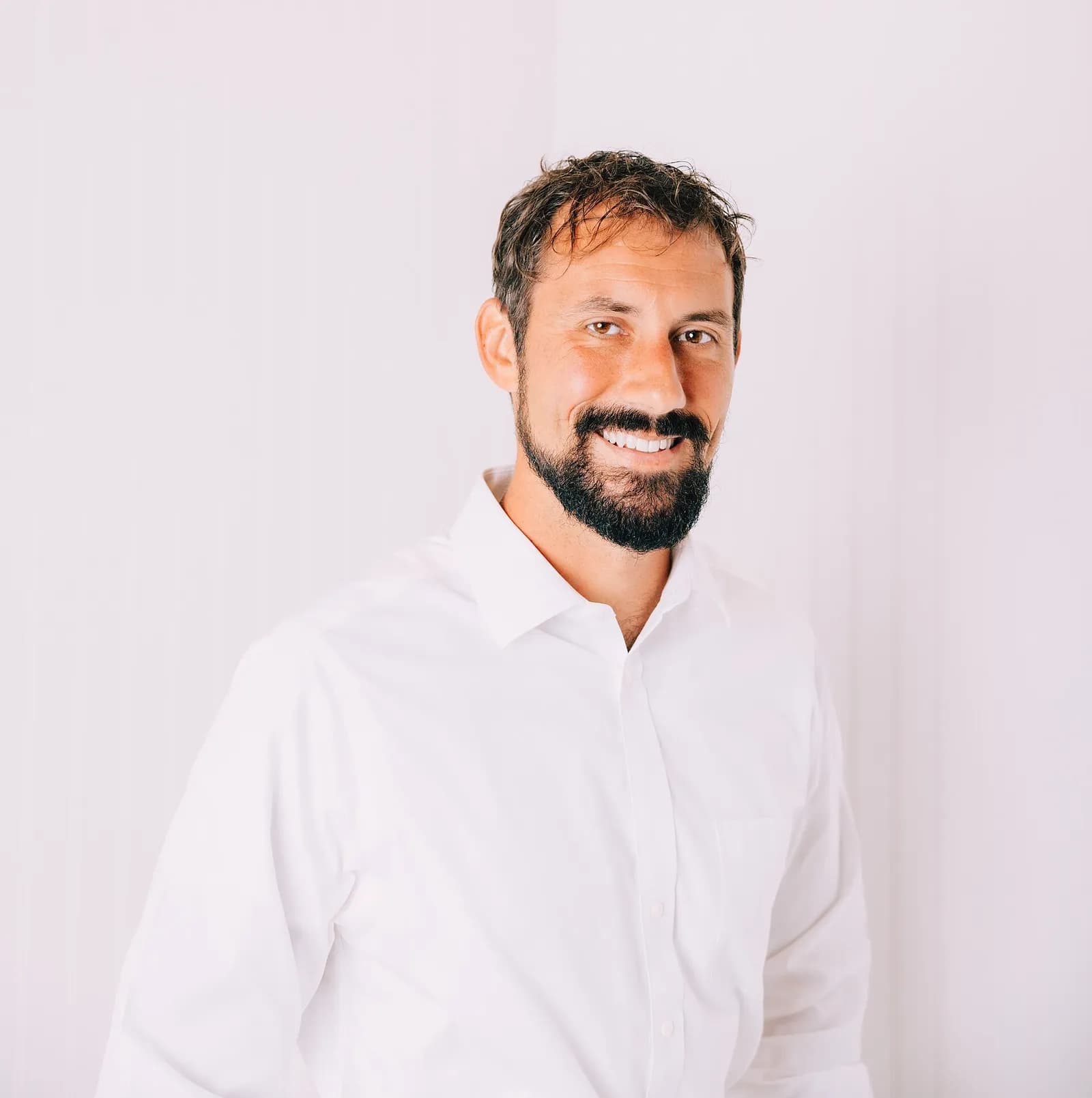 Headshot of John Drew Williams, the Democratic candidate challenging James Comer in Kentucky’s 1st Congressional District.