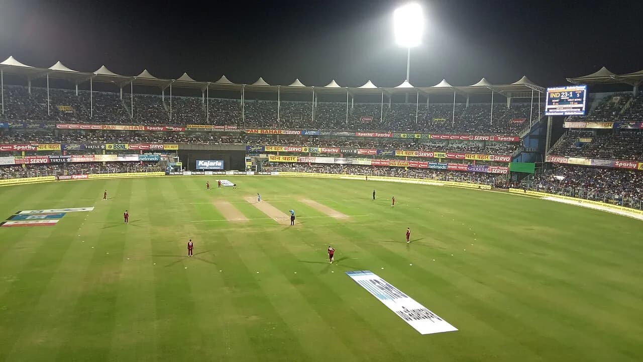 Cricket match under floodlights at Barsapara Cricket Stadium in Guwahati