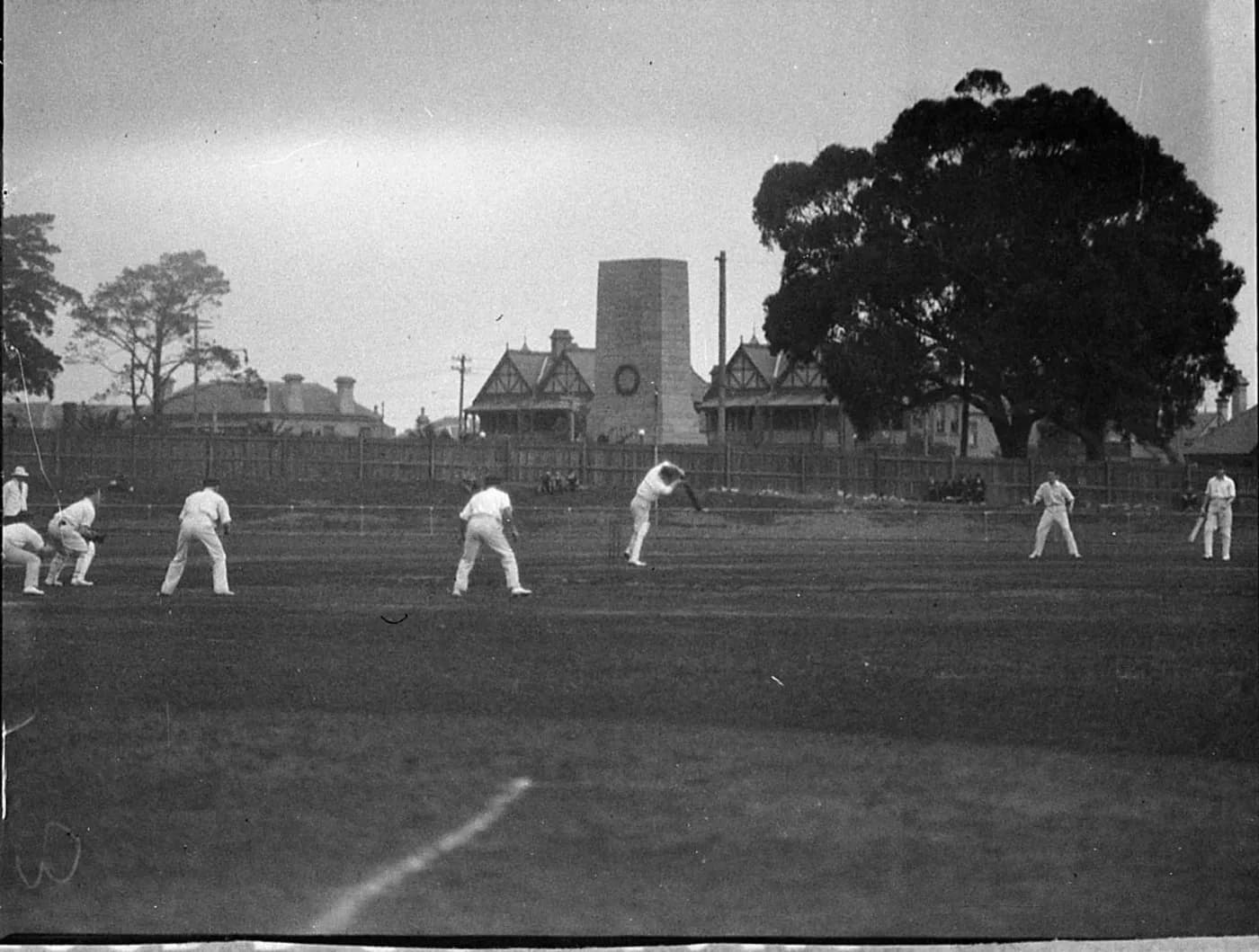 Historical view of a cricket match at North Sydney Oval.