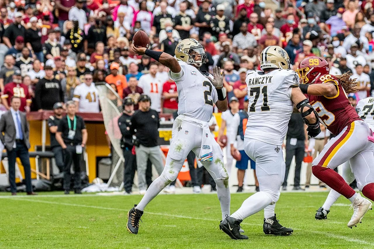 Jameis Winston preparing to throw a pass for the New Orleans Saints in a 2021 game against Washington