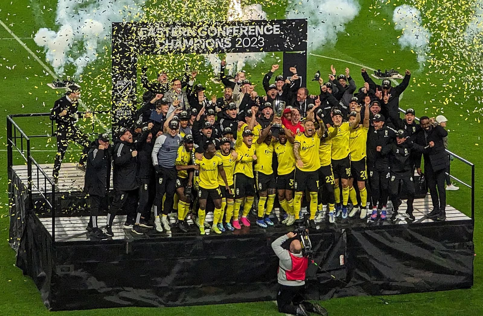 Columbus Crew players celebrate together after winning the 2023 MLS Eastern Conference final.