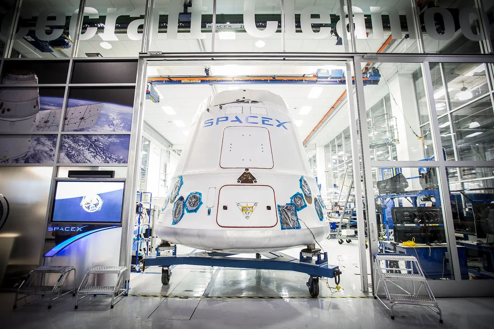 A Dragon capsule being shipped out of SpaceX headquarters in Hawthorne, California.