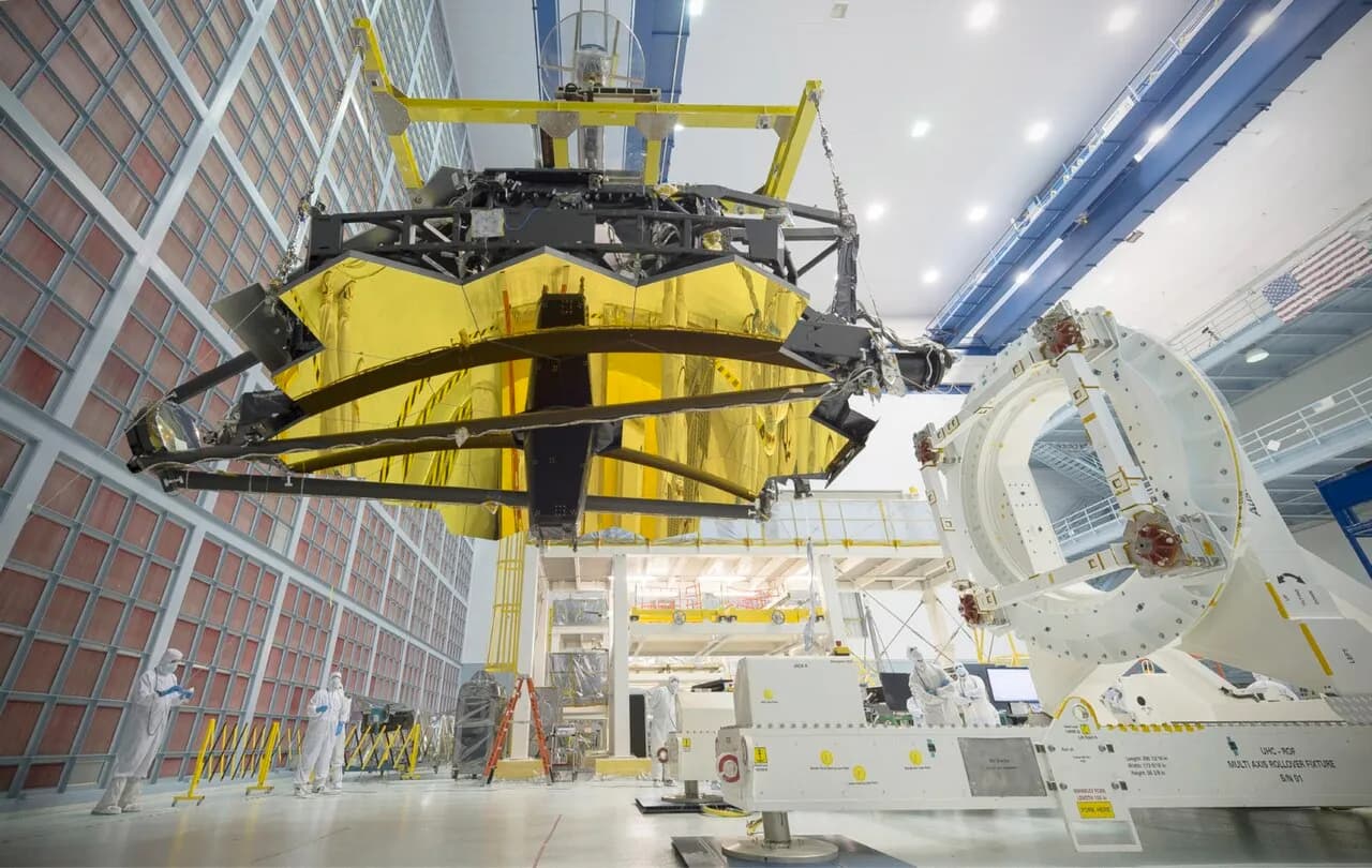 James Webb Space Telescope suspended upside down inside Goddard’s clean room.