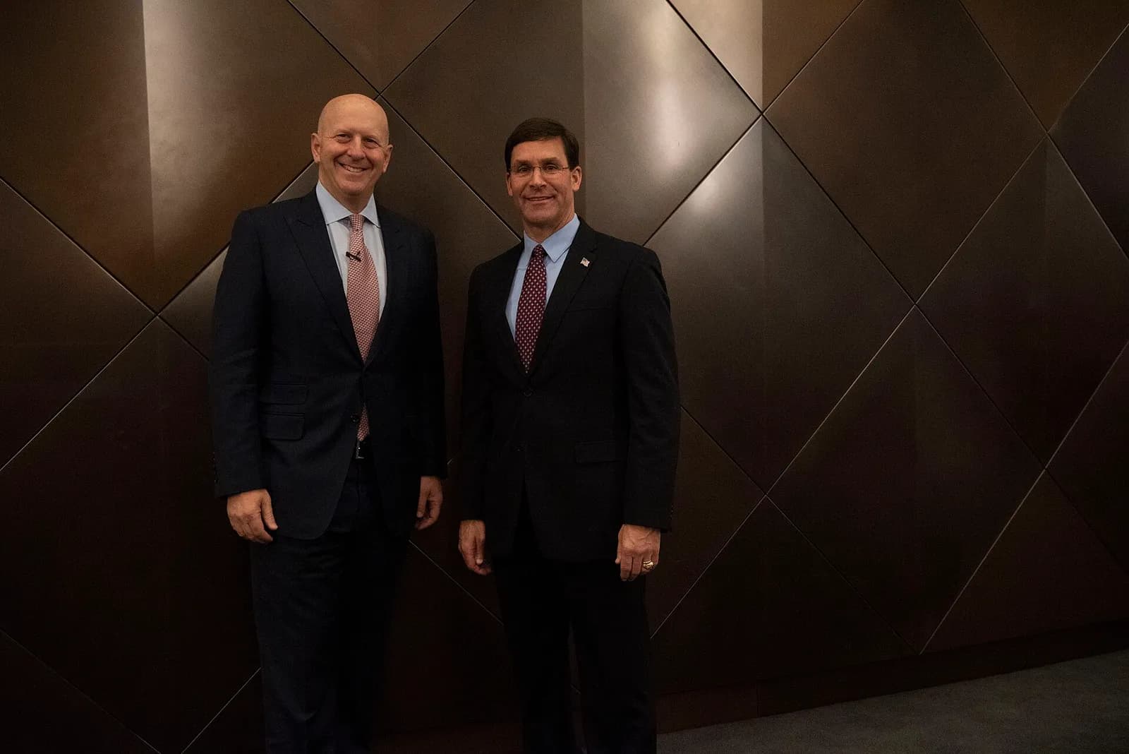 Goldman Sachs CEO David Solomon speaks with Defense Secretary Mark T. Esper.