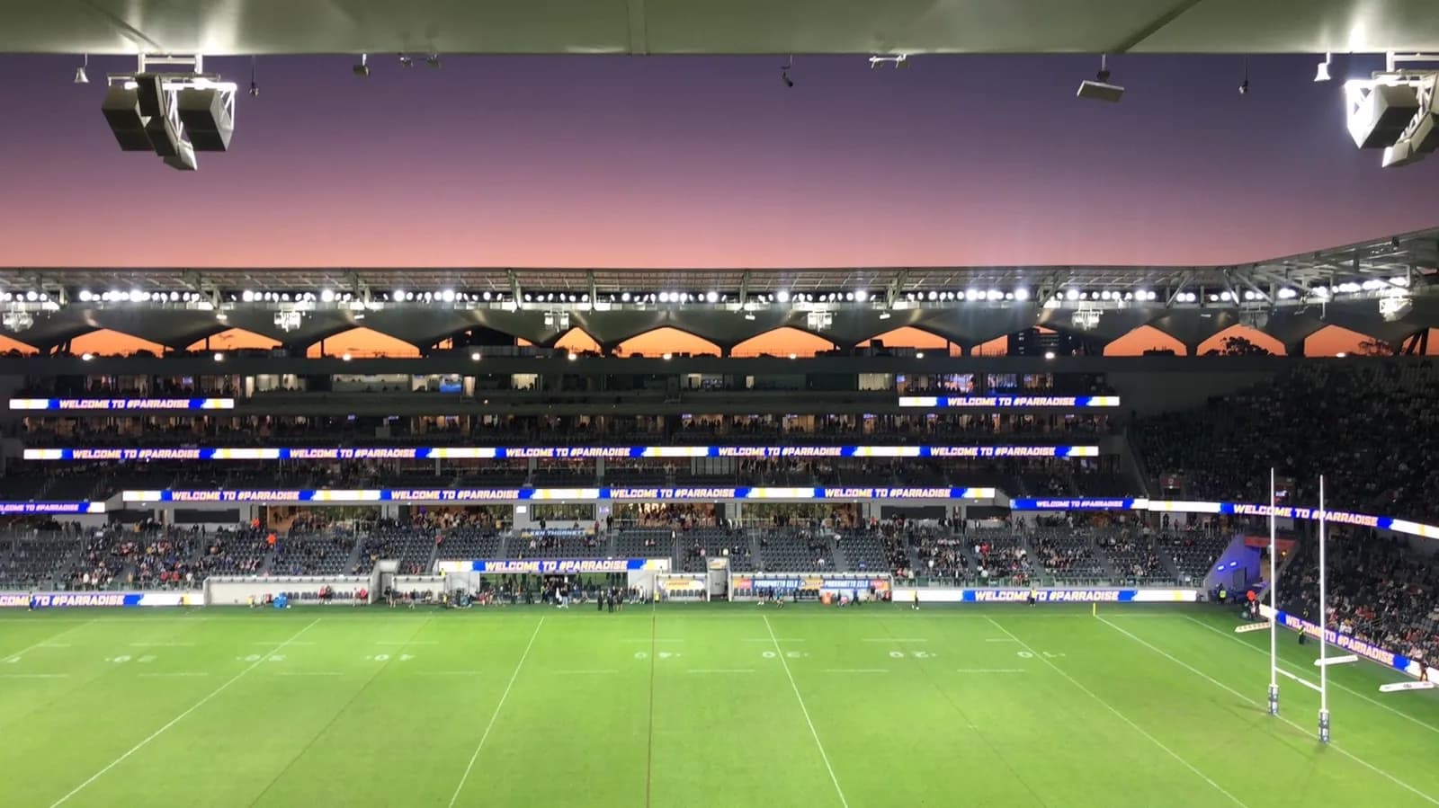 Western Sydney Stadium in Parramatta at sunset.