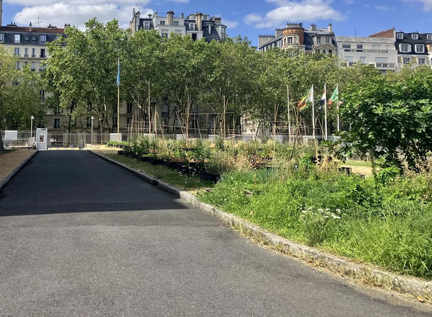 Aromatic herb garden and the main visitor entrance to the UNESCO headquarters grounds in Paris.