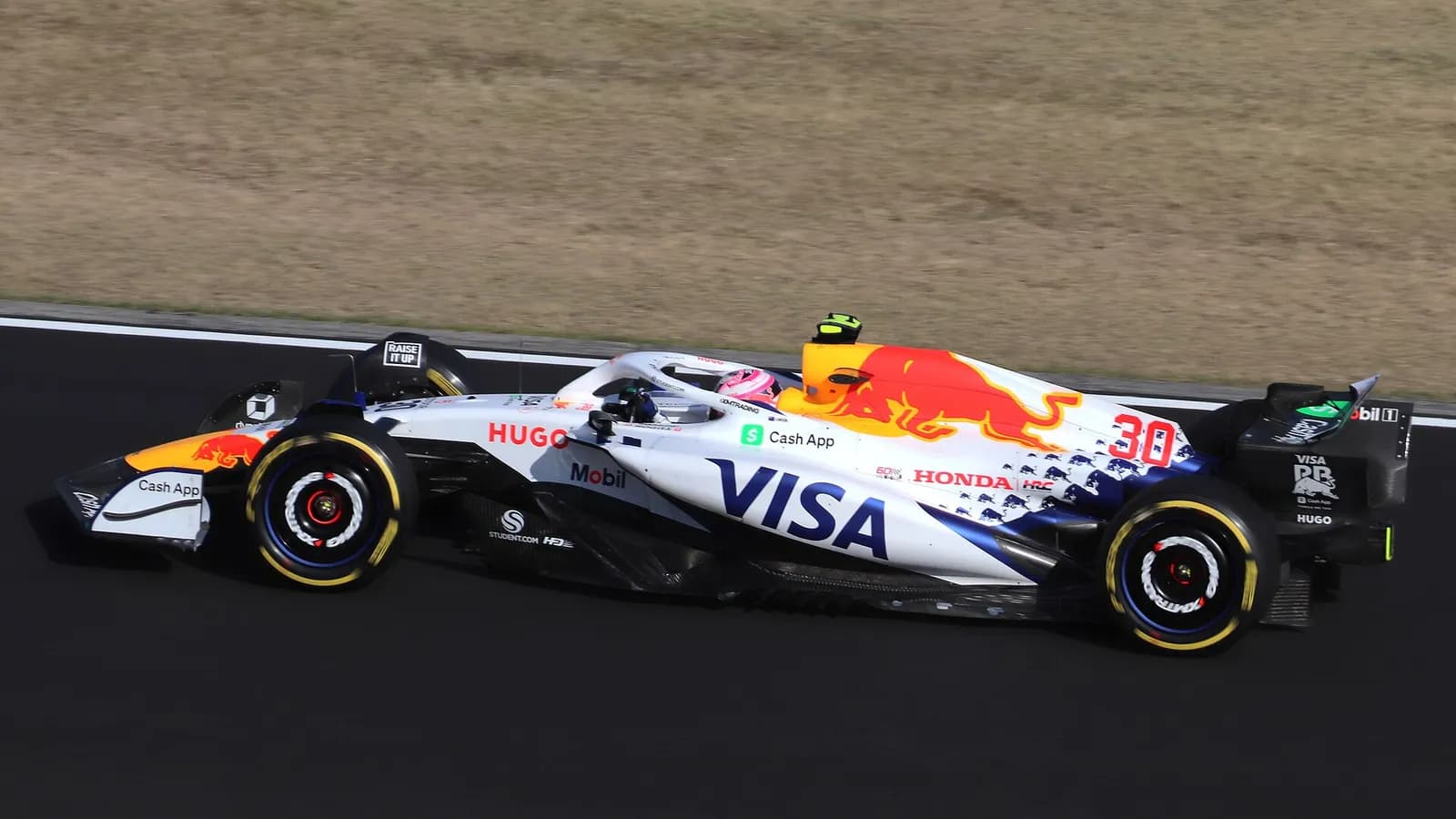 Liam Lawson driving a Racing Bulls car at Suzuka Circuit during the 2025 Japanese Grand Prix.