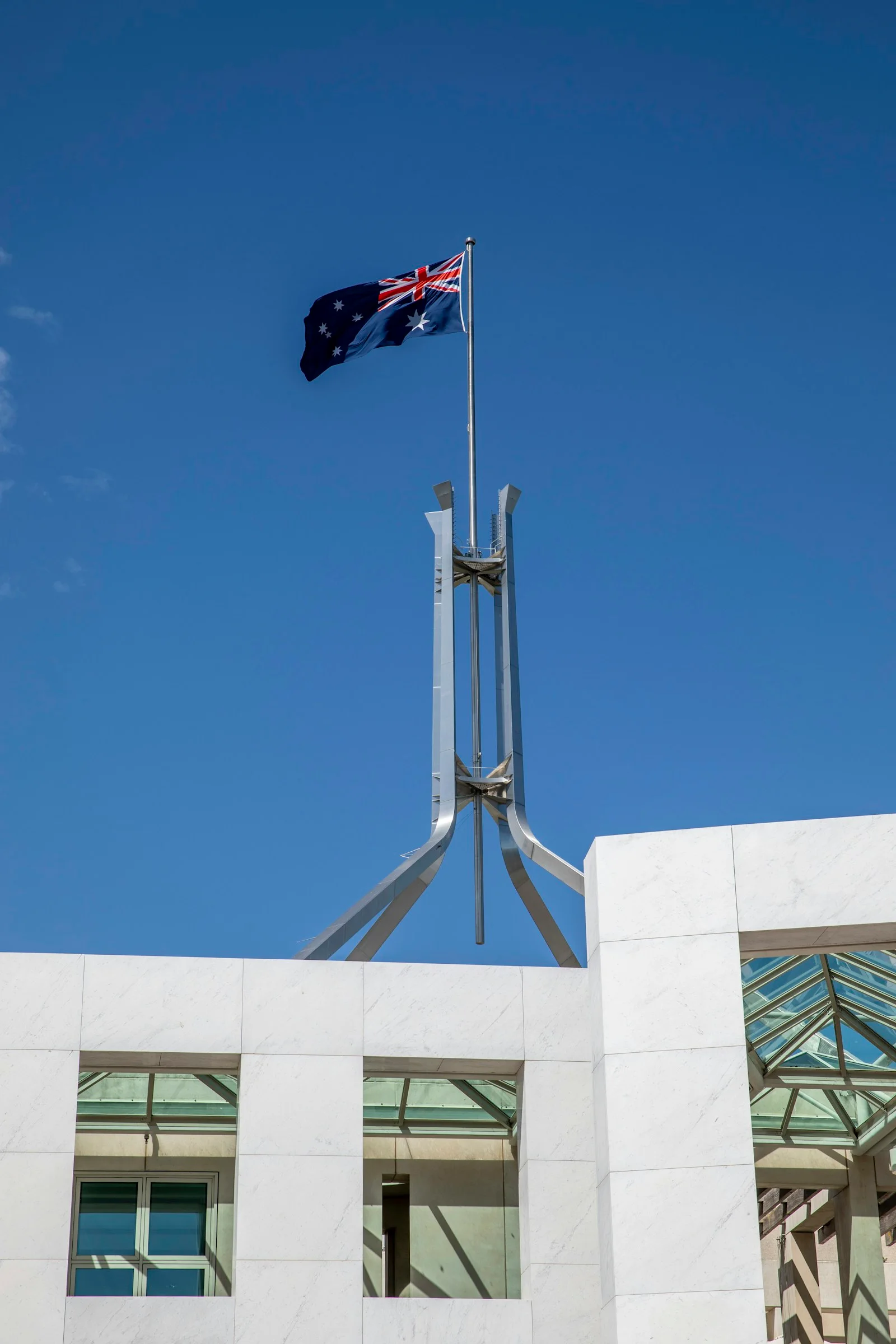 The Australian flag above Parliament House in Canberra